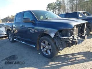 2015 Ram 1500 Big Horn z VIN 1C6RR6LT1FS770122, wystawiony jako IAAI lot #41497245 z przebiegiem 71 060 mil mil oraz . Historia ofert i sprzedaży dostępna na DreamBid. Obrazek 1.