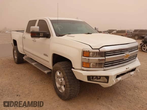 2016 Chevrolet Silverado 2500HD High Country z VIN 1GC1KXE80GF290043, wystawiony jako IAAI lot #41719644 z przebiegiem 122 715 mil mil oraz . Historia ofert i sprzedaży dostępna na DreamBid. Obrazek 1.