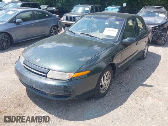 2002 Saturn LS with VIN 1G8JU54F52Y585628, listed as a IAAI auction lot 42603861 with 66,436 mi miles and . Bid and sale history available at DreamBid. Image 2.