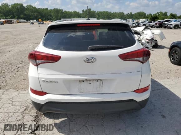 2016 Hyundai Tucson SE with VIN KM8J33A43GU077216, listed as a Copart auction lot 64403565 with 183,295 mi miles and Salvage title. Bid and sale history available at DreamBid. Image 6.