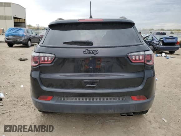 2019 Jeep Compass Altitude with VIN 3C4NJCBB2KT706637, listed as a Copart auction lot 86140265 with 161,415 mi miles and Salvage title. Bid and sale history available at DreamBid. Image 6.