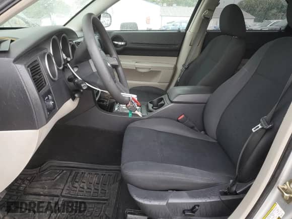 2007 Dodge Magnum with VIN 2D4FV47V17H654132, listed as a Copart auction lot 71409855 with 116,610 mi miles and Salvage title. Bid and sale history available at DreamBid. Image 7.
