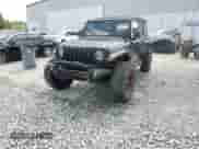 2021 Jeep Wrangler Unlimited Willys с VIN 1C4HJXDGXMW557596, выставлен на аукционе Copart как лот 66014645 с пробегом 75 456 миль миль и На запчасти • Non repairable. История ставок и продаж доступна на DreamBid. Изображение 14.