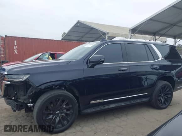 2021 Cadillac Escalade Premium Luxury with VIN 1GYS4BKL0MR459184, listed as a IAAI auction lot 42784168 with 99,340 mi miles and . Bid and sale history available at DreamBid. Image 14.