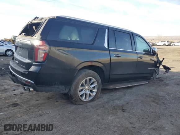 2021 Chevrolet Suburban Premier z VIN 1GNSKFKD5MR338668, wystawiony jako Copart lot #86410054 z przebiegiem Nie podano mil oraz Szkoda całkowita • Salvage title. Historia ofert i sprzedaży dostępna na DreamBid. Obrazek 3.