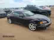2004 Hyundai Tiburon GT with VIN KMHHN65F54U112663, listed as a Copart auction lot 60543975 with 51,589 mi miles and Salvage title. Bid and sale history available at DreamBid. Image 4.