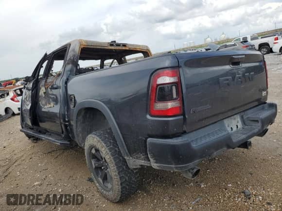 2019 Ram 1500 Rebel z VIN 1C6SRFLT2KN821072, wystawiony jako Copart lot #61198235 z przebiegiem Nie podano mil oraz Szkoda całkowita • Salvage title. Historia ofert i sprzedaży dostępna na DreamBid. Obrazek 2.