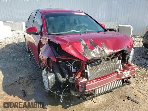 2016 Chevrolet Sonic LT with VIN 1G1JC5SB1G4180561, listed as a Copart auction lot 47017225 with 70,943 mi miles and Salvage title. Bid and sale history available at DreamBid. Image 14.