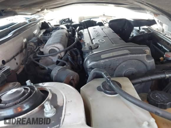 1998 Hyundai Tiburon z VIN KMHJG34F6WU115098, wystawiony jako IAAI lot #41718290 z przebiegiem 133 555 mil mil oraz . Historia ofert i sprzedaży dostępna na DreamBid. Obrazek 10.
