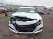 2022 Honda Accord Sport z VIN 1HGCV1F3XNA103967, wystawiony jako IAAI lot #43025818 z przebiegiem 23 128 mil mil oraz . Historia ofert i sprzedaży dostępna na DreamBid. Obrazek 12.