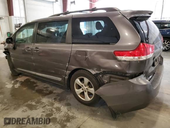 2012 Toyota Sienna LE AAS with VIN 5TDKK3DC8CS256316, listed as a Copart auction lot 66836725 with 238,189 mi miles and Salvage title. Bid and sale history available at DreamBid. Image 2.