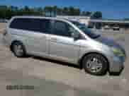 2005 Honda Odyssey EX z VIN 5FNRL38405B418106, wystawiony jako Copart lot #69424465 z przebiegiem 186 798 mil mil oraz Szkoda całkowita • Salvage title. Historia ofert i sprzedaży dostępna na DreamBid. Obrazek 4.