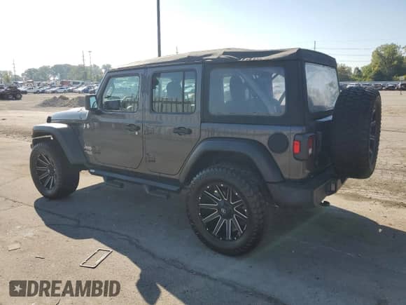 2021 Jeep Wrangler Unlimited Willys Sport with VIN 1C4HJXDG3MW530966, listed as a Copart auction lot 80820095 with 132,075 mi miles and Clean title. Bid and sale history available at DreamBid. Image 2.