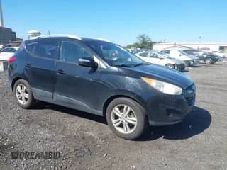 2012 Hyundai Tucson Limited z VIN KM8JUCAC1CU395060, wystawiony jako IAAI lot #43257944 z przebiegiem 235 826 mil mil oraz . Historia ofert i sprzedaży dostępna na DreamBid. Obrazek 1.