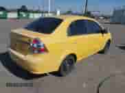 2011 Chevrolet Aveo 1LT with VIN KL1TD5DE0BB145588, listed as a IAAI auction lot 42756052 with 106,225 mi miles and . Bid and sale history available at DreamBid. Image 4.
