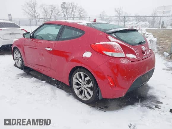 2014 Hyundai Veloster z VIN KMHTC6AD8EU214612, wystawiony jako IAAI lot #41258820 z przebiegiem 61 984 mil mil oraz . Historia ofert i sprzedaży dostępna na DreamBid. Obrazek 3.