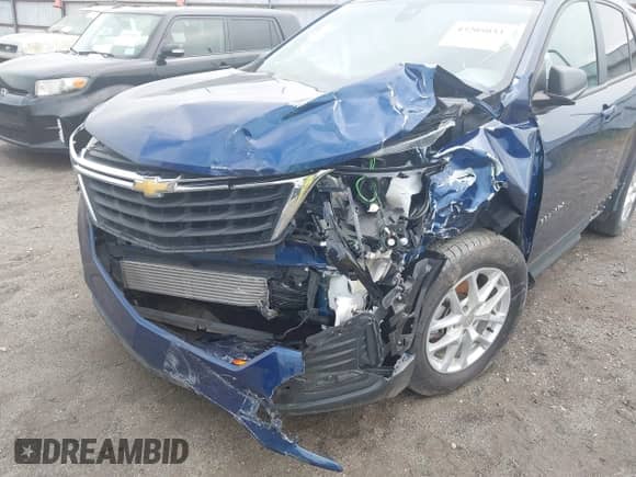 2023 Chevrolet Equinox LS z VIN 3GNAX5EG7PL180570, wystawiony jako IAAI lot #43205033 z przebiegiem 81 825 mil mil oraz . Historia ofert i sprzedaży dostępna na DreamBid. Obrazek 6.