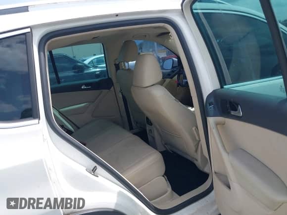 2011 Volkswagen Tiguan S with VIN WVGAV7AX9BW514225, listed as a IAAI auction lot 42461785 with 128,973 mi miles and . Bid and sale history available at DreamBid. Image 8.