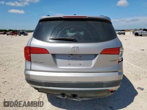 2018 Honda Pilot Touring с VIN 5FNYF5H94JB020448, выставлен на аукционе Copart как лот 65833715 с пробегом 146 320 миль миль и Списание • Salvage title. История ставок и продаж доступна на DreamBid. Изображение 6.