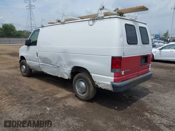 2006 Ford Econoline Cargo with VIN 1FTNE24L36HA70190, listed as a IAAI auction lot 42681517 with 232,152 mi miles and . Bid and sale history available at DreamBid. Image 3.