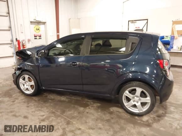 2015 Chevrolet Sonic LS with VIN 1G1JA6SH4F4160285, listed as a IAAI auction lot 42436278 with 94,122 mi miles and . Bid and sale history available at DreamBid. Image 15.