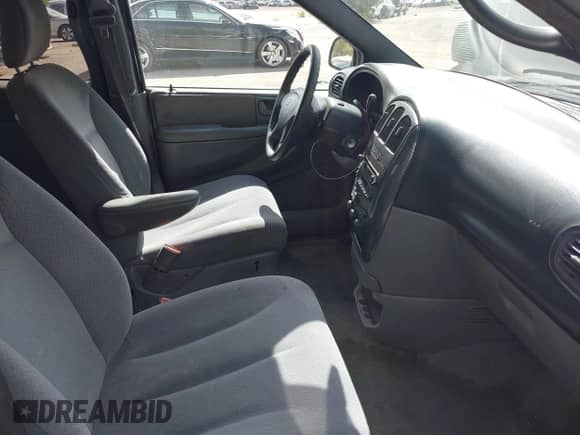 2005 Dodge Caravan SXT with VIN 2D4GP44L75R193138, listed as a IAAI auction lot 42073429 with 206,915 mi miles and . Bid and sale history available at DreamBid. Image 5.
