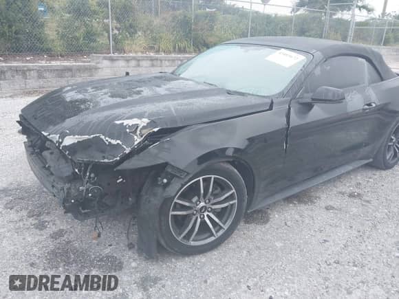 2015 Ford Mustang EcoBoost Premium z VIN 1FATP8UH2F5377230, wystawiony jako IAAI lot #43403672 z przebiegiem 94 934 mil mil oraz . Historia ofert i sprzedaży dostępna na DreamBid. Obrazek 6.