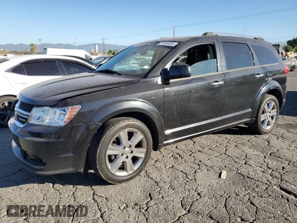 2011 Dodge Journey LUX с VIN 3D4PG9FG4BT516244, выставлен на аукционе Copart как лот 77404454 с пробегом 129 549 миль миль и Списание • Salvage title. История ставок и продаж доступна на DreamBid. Изображение 1.