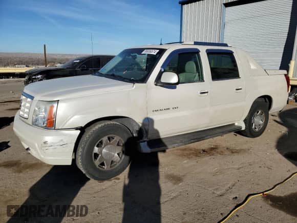 2002 Cadillac Escalade EXT with VIN 3GYEK63N72G231660, listed as a Copart auction lot 86656574 with 99,405 mi miles and Salvage title. Bid and sale history available at DreamBid. Image 1.