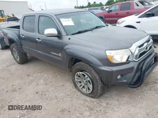 2015 Toyota Tacoma PreRunner z VIN 5TFJU4GN8FX082612, wystawiony jako IAAI lot #42301298 z przebiegiem 167 208 mil mil oraz . Historia ofert i sprzedaży dostępna na DreamBid. Obrazek 1.