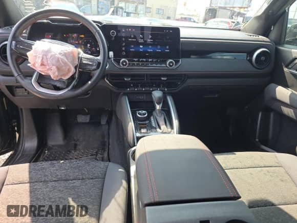 2024 Chevrolet Colorado 4WD Z71 с VIN 1GCPTDEK8R1316907, выставлен на аукционе Copart как лот 80474875 с пробегом 18 088 миль миль и Списание • Salvage title. История ставок и продаж доступна на DreamBid. Изображение 9.