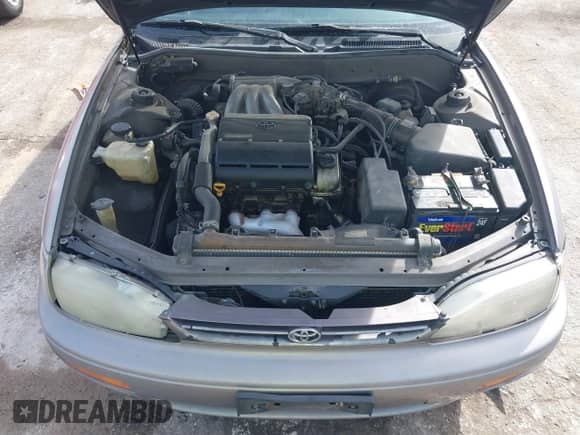 1995 Toyota Camry LE z VIN 4T1GK12E7SU081447, wystawiony jako IAAI lot #41607375 z przebiegiem 234 250 mil mil oraz . Historia ofert i sprzedaży dostępna na DreamBid. Obrazek 10.