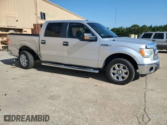 2013 Ford F-150 XL with VIN 1FTFW1CF8DFC24571, listed as a Copart auction lot 80031555 with 139,643 mi miles and Salvage title. Bid and sale history available at DreamBid. Image 4.