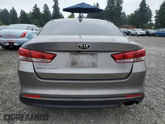 2018 Kia Optima LX z VIN 5XXGT4L37JG199924, wystawiony jako Copart lot #72044225 z przebiegiem 141 760 mil mil oraz Szkoda całkowita • Salvage title. Historia ofert i sprzedaży dostępna na DreamBid. Obrazek 6.