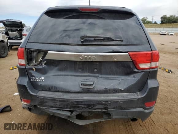 2012 Jeep Grand Cherokee Laredo z VIN 1C4RJFAG5CC202791, wystawiony jako Copart lot #86040175 z przebiegiem 206 265 mil mil oraz Szkoda całkowita • Salvage title. Historia ofert i sprzedaży dostępna na DreamBid. Obrazek 6.