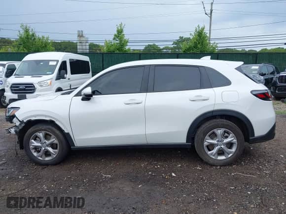 2024 Honda HR-V LX с VIN 3CZRZ2H31RM751488, выставлен на аукционе IAAI как лот 42642690 с пробегом 12 169 миль миль и . История ставок и продаж доступна на DreamBid. Изображение 14.