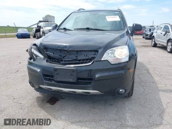 2014 Chevrolet Captiva Sport LTZ z VIN 3GNAL4EK2ES630641, wystawiony jako IAAI lot #42646081 z przebiegiem 154 830 mil mil oraz . Historia ofert i sprzedaży dostępna na DreamBid. Obrazek 6.