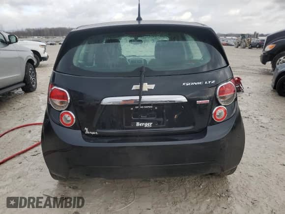 2014 Chevrolet Sonic LTZ with VIN 1G1JE6SB0E4177132, listed as a Copart auction lot 47232635 with 118,512 mi miles and Clean title. Bid and sale history available at DreamBid. Image 6.