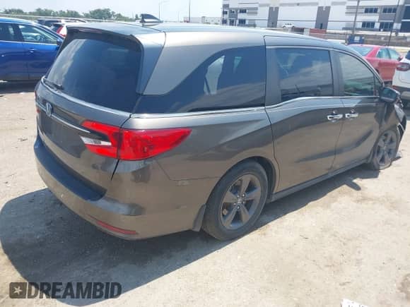 2021 Honda Odyssey EX z VIN 5FNRL6H50MB027580, wystawiony jako IAAI lot #43055794 z przebiegiem 96 516 mil mil oraz . Historia ofert i sprzedaży dostępna na DreamBid. Obrazek 4.