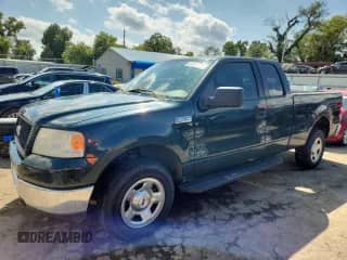 2005 Ford F-150 XLT with VIN 1FTPX14515NA03344, listed as a Copart auction lot 81421415 with 213,914 mi miles and Salvage title. Bid and sale history available at DreamBid. Image 1.