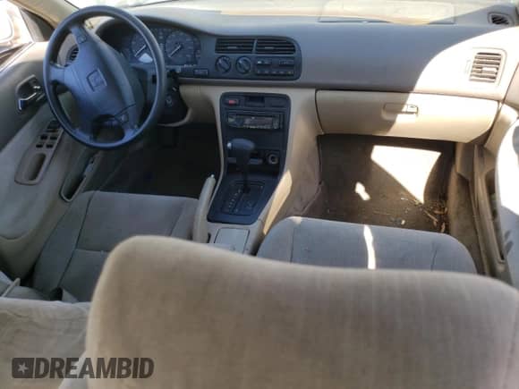 1994 Honda Accord LX z VIN 1HGCD5631RA137411, wystawiony jako Copart lot #76126484 z przebiegiem 212 681 mil mil oraz Szkoda całkowita • Salvage title. Historia ofert i sprzedaży dostępna na DreamBid. Obrazek 8.