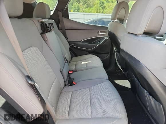 2018 Hyundai Santa Fe 2.4L z VIN 5XYZTDLBXJG553205, wystawiony jako Copart lot #83936445 z przebiegiem 123 928 mil mil oraz Szkoda całkowita • Salvage title. Historia ofert i sprzedaży dostępna na DreamBid. Obrazek 11.