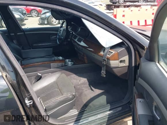 2004 BMW 7 Series 745Li with VIN WBAGN63464DS51067, listed as a IAAI auction lot 42681232 with 125,088 mi miles and . Bid and sale history available at DreamBid. Image 5.