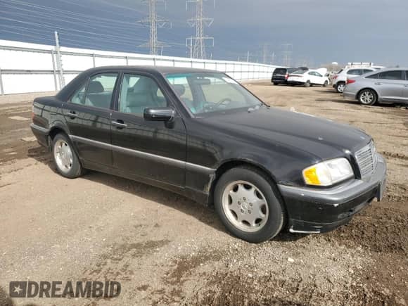 1999 Mercedes-Benz C 230/260/280/320 z VIN WDBHA24G9XA716840, wystawiony jako Copart lot #49605205 z przebiegiem 56 535 mil mil oraz Czysty tytuł • Clean title. Historia ofert i sprzedaży dostępna na DreamBid. Obrazek 4.