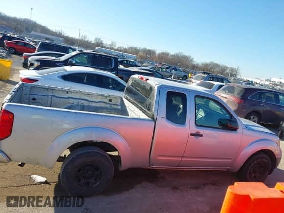 2015 Nissan Frontier S with VIN 1N6BD0CT9FN729481, listed as a IAAI auction lot 41444198 with 193,771 mi miles and . Bid and sale history available at DreamBid. Image 13.
