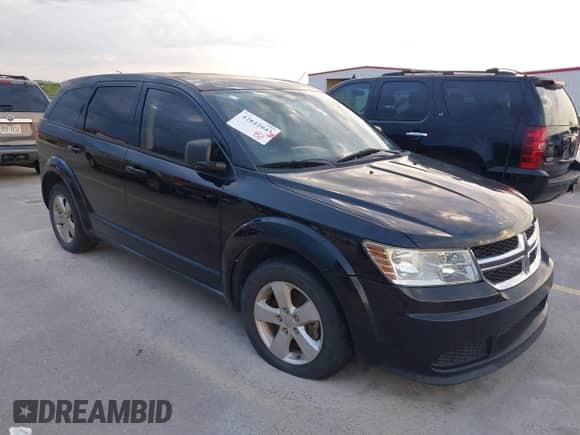 2013 Dodge Journey American Value z VIN 3C4PDCAB9DT532263, wystawiony jako IAAI lot #42842843 z przebiegiem 164 659 mil mil oraz . Historia ofert i sprzedaży dostępna na DreamBid. Obrazek 1.