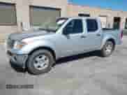 2006 Nissan Frontier LE with VIN 1N6AD07U56C472233, listed as a IAAI auction lot 43039519 with 123,029 mi miles and . Bid and sale history available at DreamBid. Image 2.