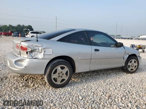 2000 Chevrolet Cavalier with VIN 1G1JC1243Y7363101, listed as a Copart auction lot 57591485 with 252,742 mi miles and Salvage title. Bid and sale history available at DreamBid. Image 3.