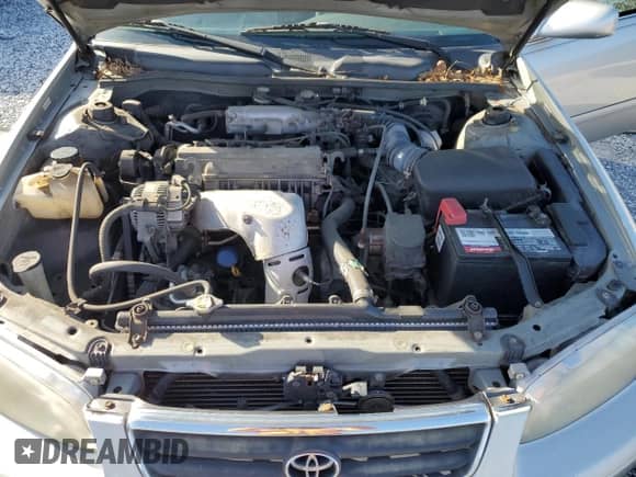 2001 Toyota Camry LE z VIN 4T1BG22K21U042545, wystawiony jako Copart lot #84619355 z przebiegiem 112 453 mil mil oraz Szkoda całkowita • Salvage title. Historia ofert i sprzedaży dostępna na DreamBid. Obrazek 11.