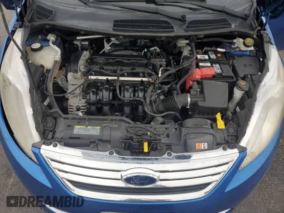 2011 Ford Fiesta SE z VIN 3FADP4BJ2BM118972, wystawiony jako Copart lot #85824375 z przebiegiem Nie podano mil oraz Szkoda całkowita • Salvage title. Historia ofert i sprzedaży dostępna na DreamBid. Obrazek 11.